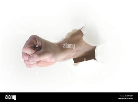 Hand Punching Through Paper On White Background Stock Photo Alamy