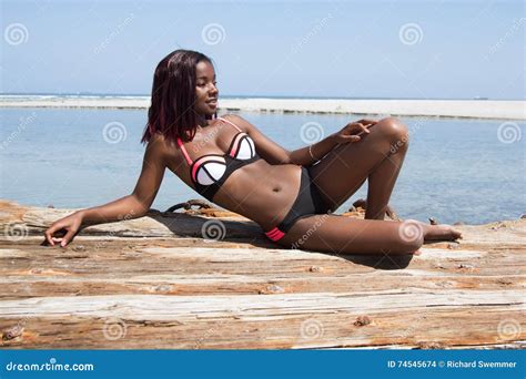Beautiful African Woman Sitting On The Beach Stock Photo Image Of African Ethnic