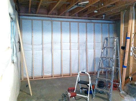 Have all the crowns face the same direction. Framing Basement Walls - How To Build Floating Walls