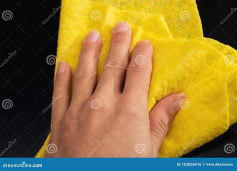 Yellow Rag In The Hand Close Up Stock Photo Image Of Cotton Fabric