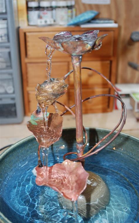 Sunnydaze copper flower blossoms outdoor garden water fountain, 28 inch tall. Cat Fountains