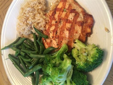 Grilled Salmon With Steamed Broccoli And Green Beans And Brown Rice