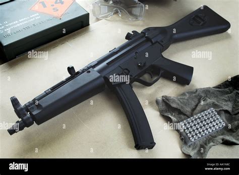 A Police Heckler And Koch Mp5 Assault Rifle With Bullets And Ammuntion