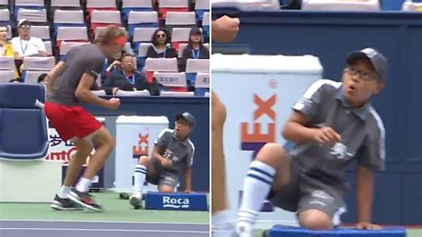 Watch Tennis Players Intense Celebration Scares Ball Boy