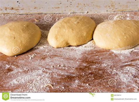 Portions Of Bread Dough Left To Rise Stock Photo Image Of Uncooked