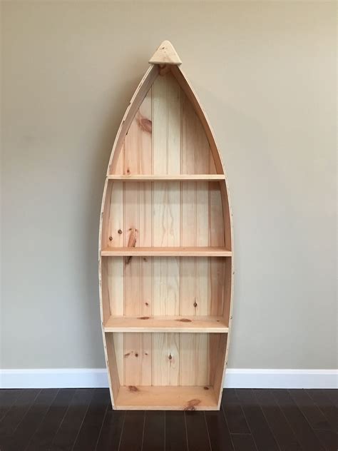 Show off the beautiful wood grain, and brad rodriguez on instagram: Boat bookshelf | Boat shelf decor, Boat furniture, Log ...