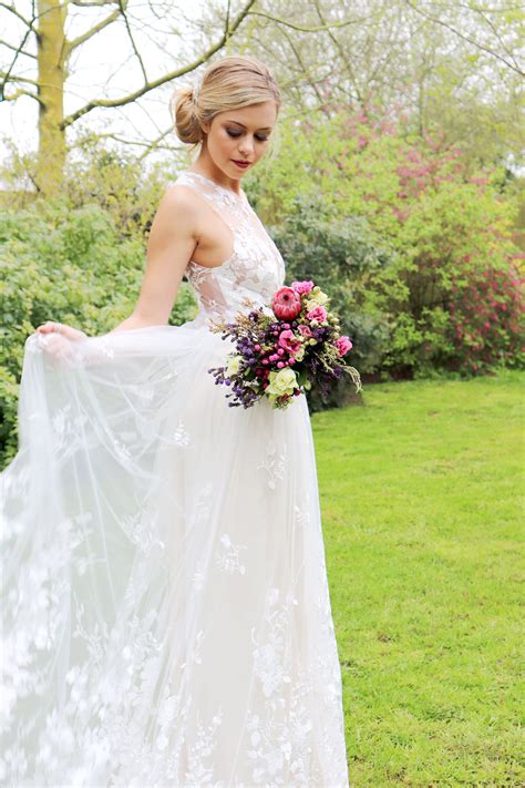 A Floral Embroidered Tulle Dress With Champagne Under Skirt Bridal