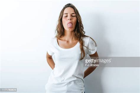 Woman Sticking Tongue Out White Background Bildbanksfoton Och Bilder