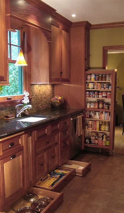 The bookshelf used in this kitchen creates a division between the kitchen and the rest of the house. Clever Kitchen Storage Ideas - Hative