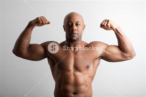 Toned And Ripped Lean Muscle Fitness Body Builder Flexing Royalty Free