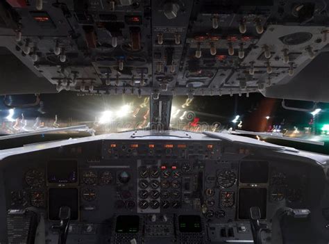 View Through Pilot Cabin To The Airfield At Night Stock Photo Image