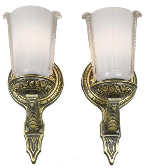 Our bold and stylized art deco wall sconces shine with retro sophistication. Lovely pair of Circa 1920 wall sconces | Modernism