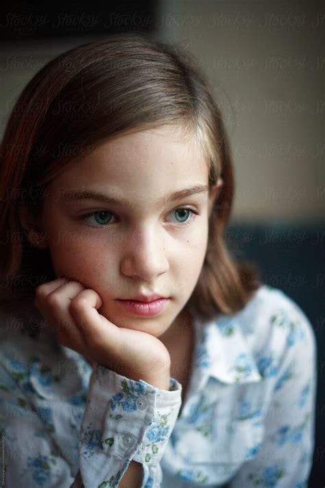 Young Girl Looking Bored With Hand Under Chin By Stocksy Contributor Dina Marie Giangregorio