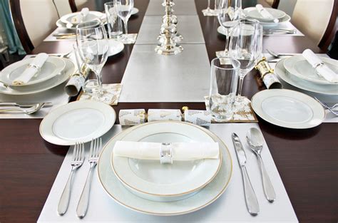 This gorgeous and airy table setting from designthusiasm draws on pinks, golds, and peonies, using christmas ornaments and faux flowers to finish the look. AM Dolce Vita: 2013 Holiday Dinner Table Setting