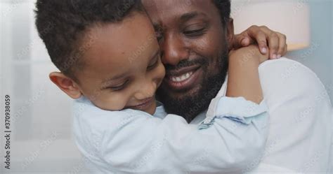 Vidéo Stock Close Up Portrait Of Happy African American Dad Hugging And