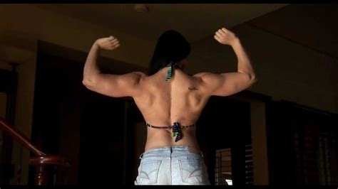 Massive Young Female Bodybuilder Posing And Flexing Her 17 Inch Biceps