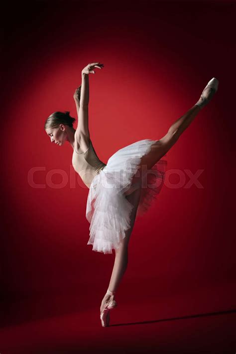 Ballerina Young Graceful Female Ballet Dancer Dancing At Red