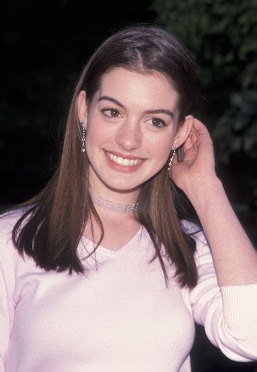 Anne Hathaways Ever Changing Hairstylesfrom The Princess Diaries To