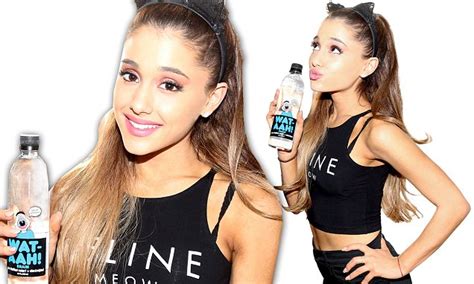 Ariana Grande Slips On Kitten Ears And A Crop Top To Partner With Wat Aah Water Daily Mail Online