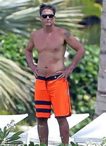 rob lowe shows off his toned torso as he dons shorts in hawaii daily mail online