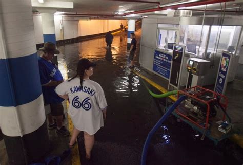 Police Rescue 2 Men From Water Filled Elevator During Toronto Flooding