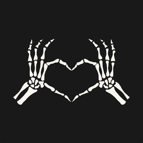 Two Hands In The Shape Of A Heart On A Black Background With White