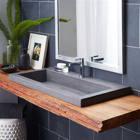 For guest or master baths, however, unique sinks are available that can be artful statement pieces all on their own, from ornate glass vessel sinks, to shallow basin sinks, all in a variety of colors and designs. Trough 3619 Bathroom Sink | Stone bathroom sink, Drop in ...