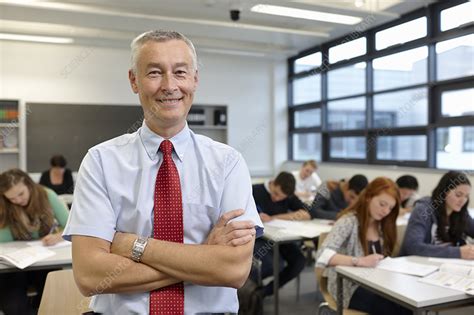 Mature Male Teacher In Classroom Stock Image F009 9689 Science Photo Library
