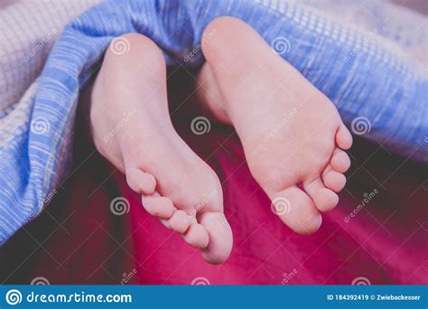 Time To Sleep Close Up Groomed Bare Feet Of Cute Little