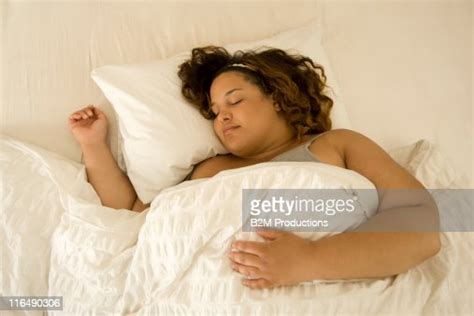 Fat Woman Sleeping In Bed Photo Getty Images