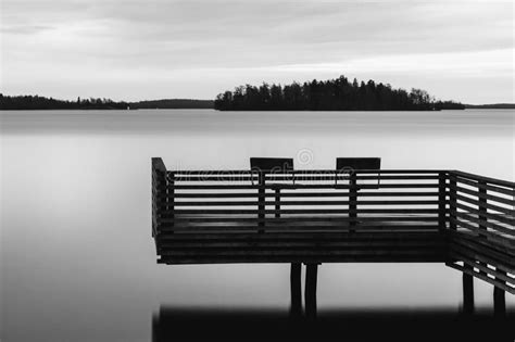 Photo About Black And White Tranquil Scenery Of A Lake With Pier And