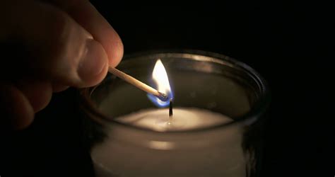 Slow Motion Shot Of Hand Lighting Candle Stock Footage Sbv 314007114