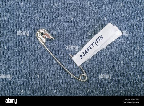 Safety Pin On Clothes With Label Safetypin As A Symbol Of Solidarity
