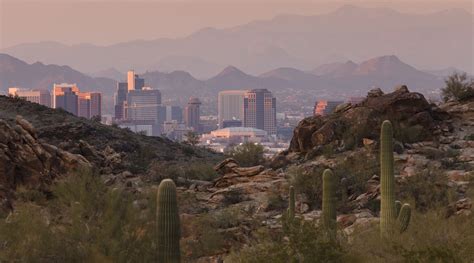 We have an extensive collection of amazing background images carefully chosen by our community. Hazy sunset skyline of Phoenix Arizona city and landscape - 2060 Digital