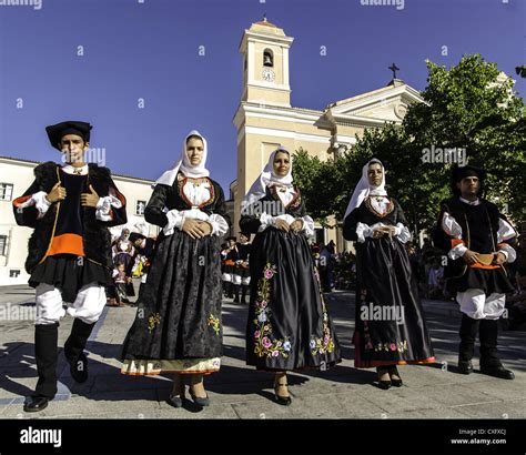 People Wearing Traditional Sardinian Costume At The Religious Feast