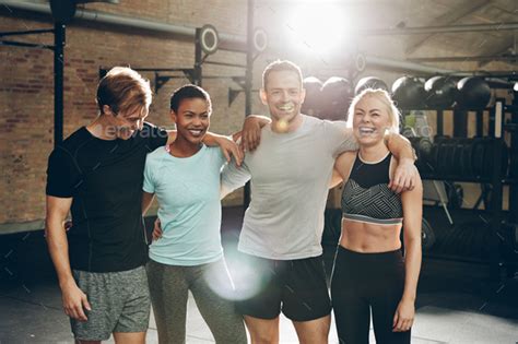 Smiling Group Of Friends Standing Together After A Gym Workout Stock