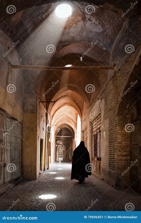 woman in veil passing through grand old bazaar of yazd stock image image of historical light