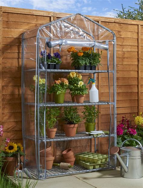 Greenhouse gases are gases in earth's atmosphere that trap heat. Growing Tomatoes in a Grow-house (Mini-Greenhouse)