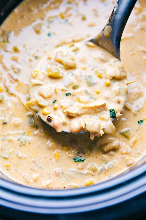 Place all ingredients except the corn chips in a crockpot. CrockPot White Chicken Chili {Secret Ingredient ...