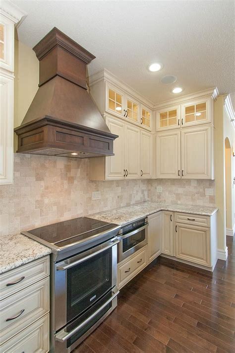 Offer a great price point and value for your home if you are working within a budget. Designers: Laura (cabinets), Nick (flooring) Main Cabinets: Dura Supreme Cabinetry Maple, Ven ...