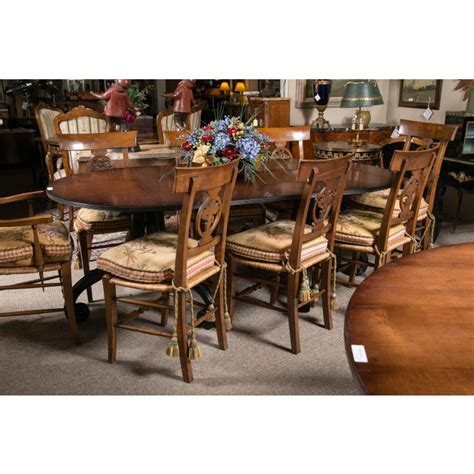 A luxe expression for the holiday table. Ralph Lauren Scroll Base Dining Table | Chairish