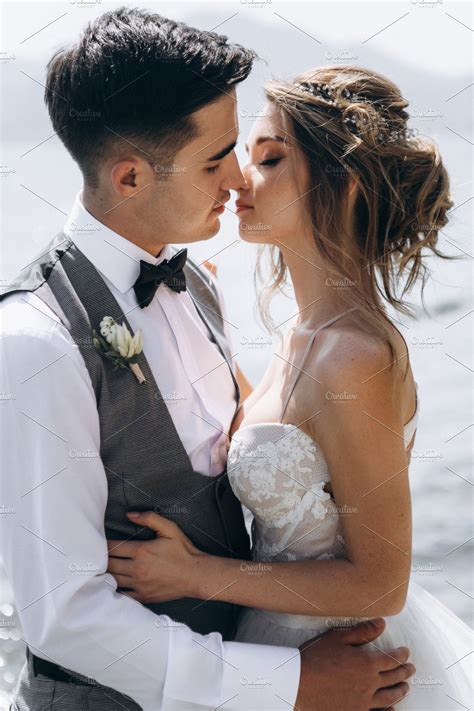 beautiful wedding couple kissing high quality people images ~ creative market