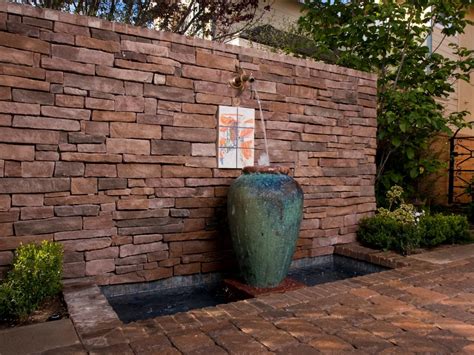 Maybe you would like to learn more about one of these? Stacked Stone Wall With Urn Water Feature | HGTV