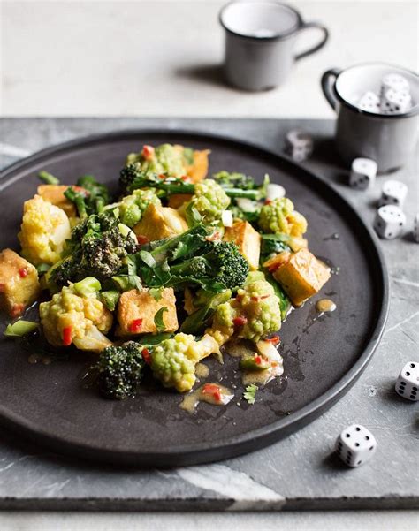 Sprinkle with nuts and bacon before serving. Warm salad of fried tofu, broccoli, romanesco and miso ...