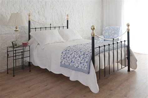 There were several iron beds here that my grandmother had painted white, however, everyone thought this was a 3/4 bed, so it escaped the white paint, thankfully. The story behind the Wrought Iron Bed Company