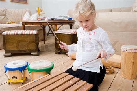 A Young Girl Playing With Xylophone Stock Image Colourbox