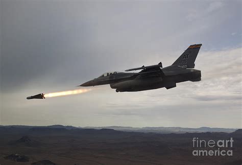 An F 16 Fighting Falcon Fires An Agm 65 Photograph By High G Productions