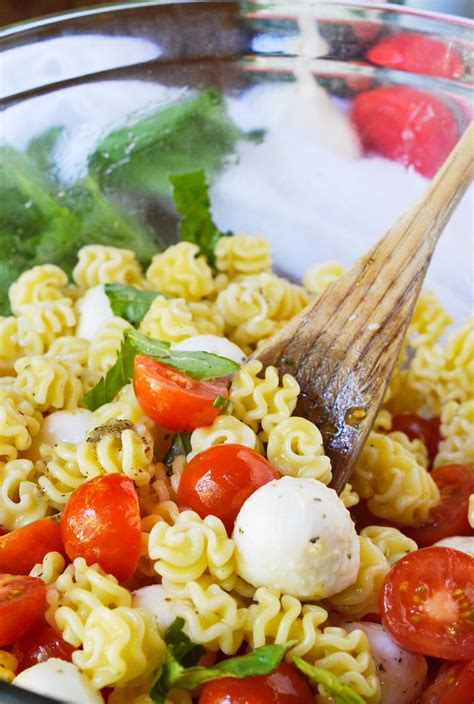 If you make this in advance, reserve a bit of the dressing to add right before serving, as the pasta has a tendency to soak up the dressing as it sits over. Caprese Pasta Salad Recipe - WonkyWonderful