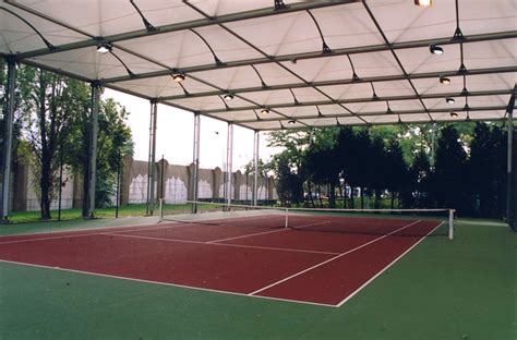 Un court de tennis couvert à coté du jardin du luxembourg : Préau terrain Multisports: charpente bois ou alu pour ...