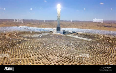 Solar Power Tower And Mirrors That Focus The Suns Rays Upon A Collector Tower To Produce